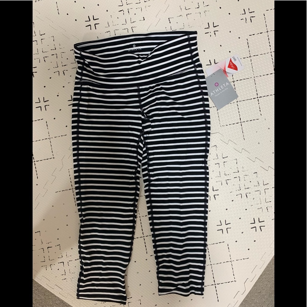 Brand new Athleta “stripes chaturanga capri” leggings. Tags still on.